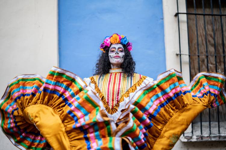 woman dressed for Dia de los Muertos